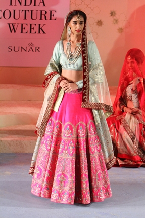 This one from Anju Modi is one of my favourites, an outfit that I would have gladly worn for my own wedding! The vibrant colours are perfect for a day wedding. This look makes me imagine the bride coming out of a beautifully decorated palki, with a decorated mandap reflected in the swimming pool!